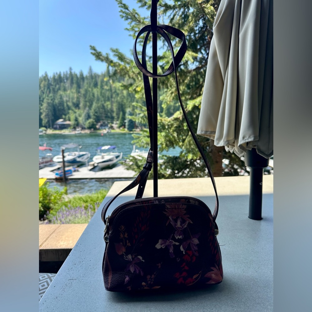 A new day burgundy with orange, red, and purple flowered crossbody handbag purse